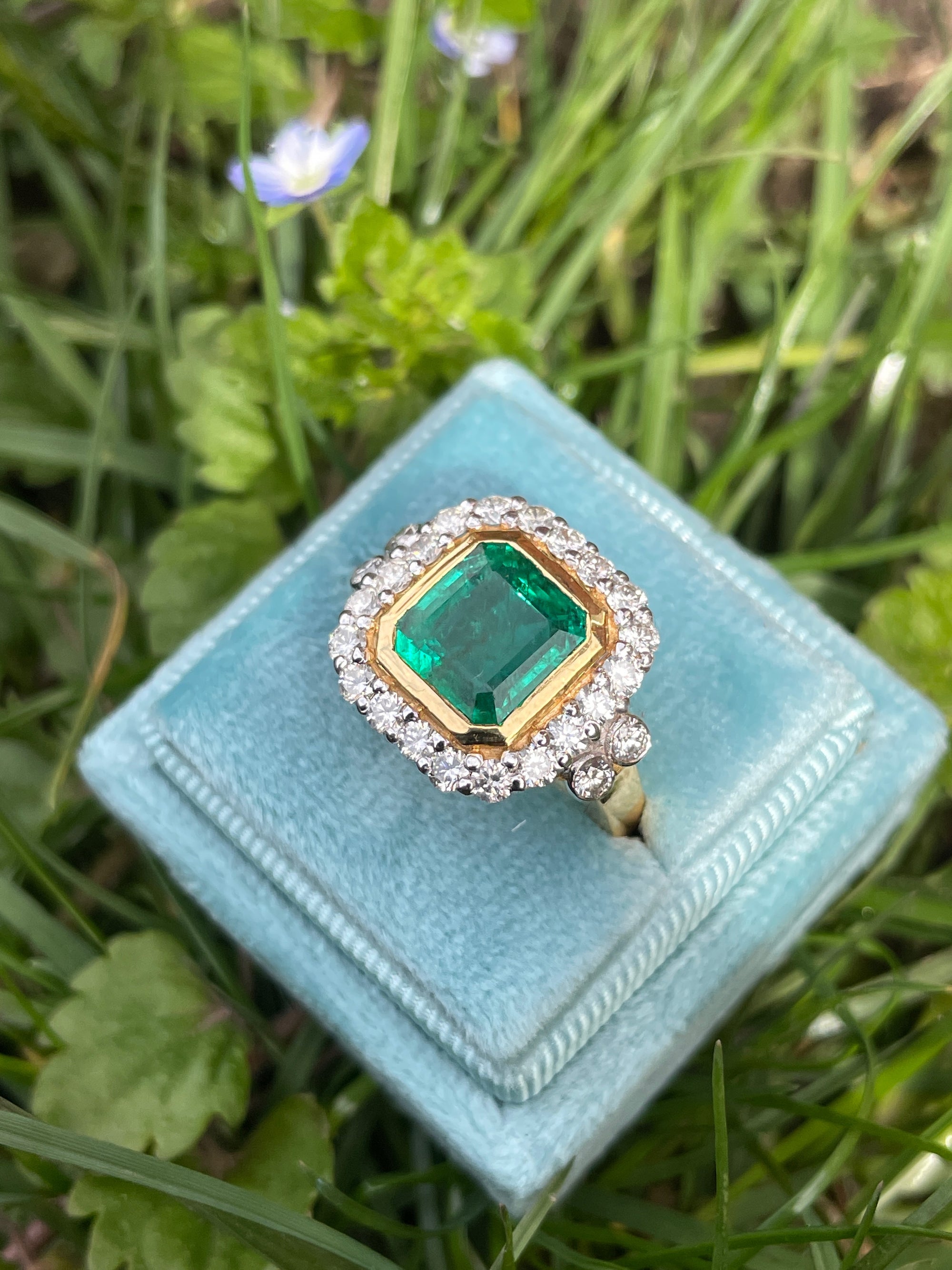 3 Carat Emerald and Diamond Halo Bezel Set Cocktail Engagement Ring in White and Yellow Gold 