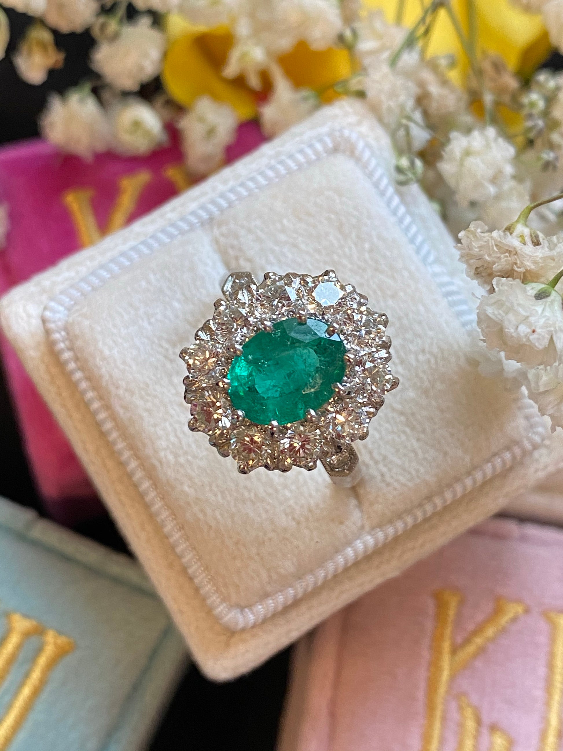 1.54 Carat Oval Cut Emerald and Diamond Halo Engagement Ring in Platinum 