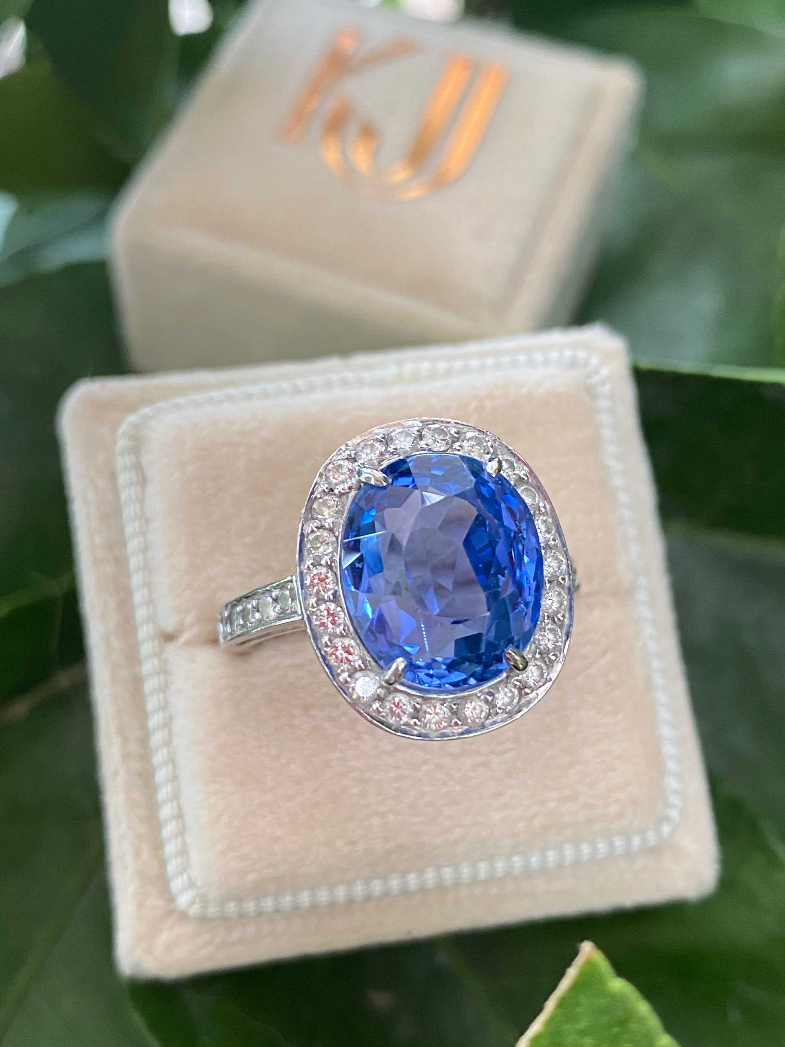 9.50 Oval-cut Carat Blue Ceylon Sapphire and DIamond Halo Ring 