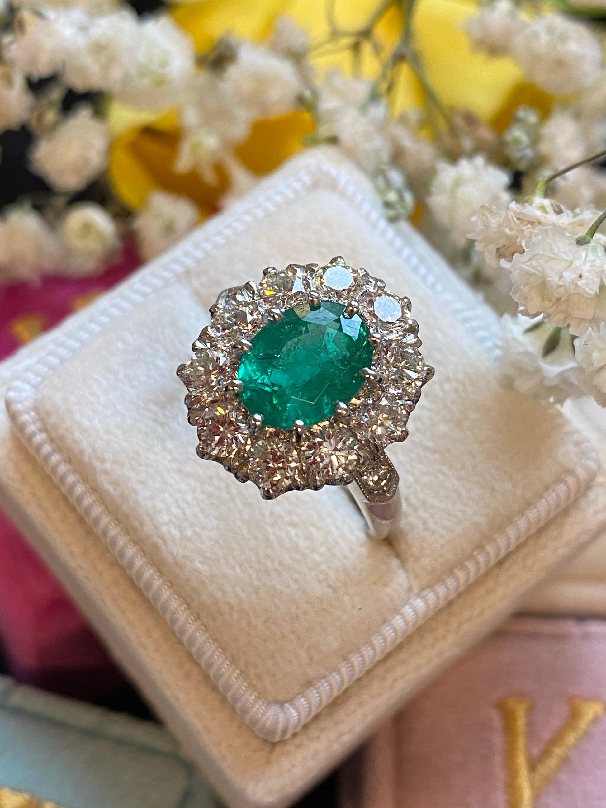 1.54 Carat Oval Cut Emerald and Diamond Halo Engagement Ring in Platinum 