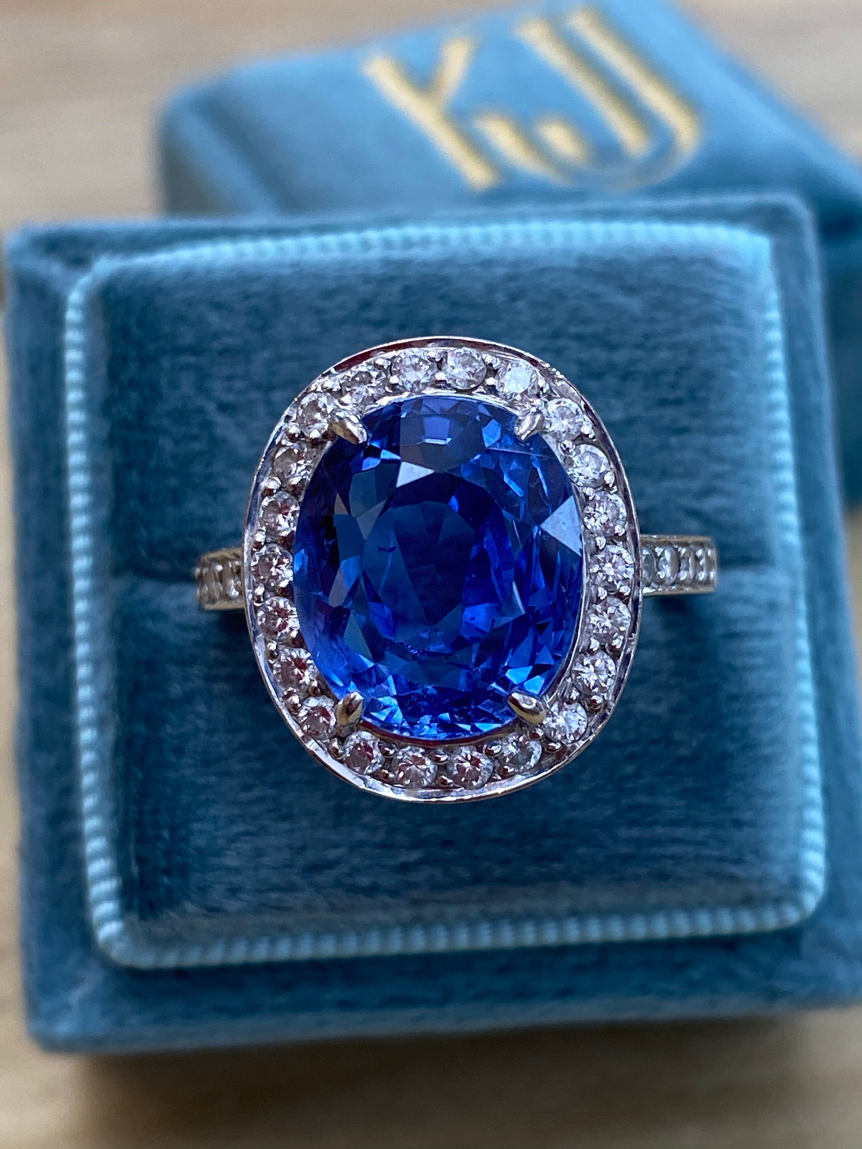 9.50 Oval-cut Carat Blue Ceylon Sapphire and DIamond Halo Ring 