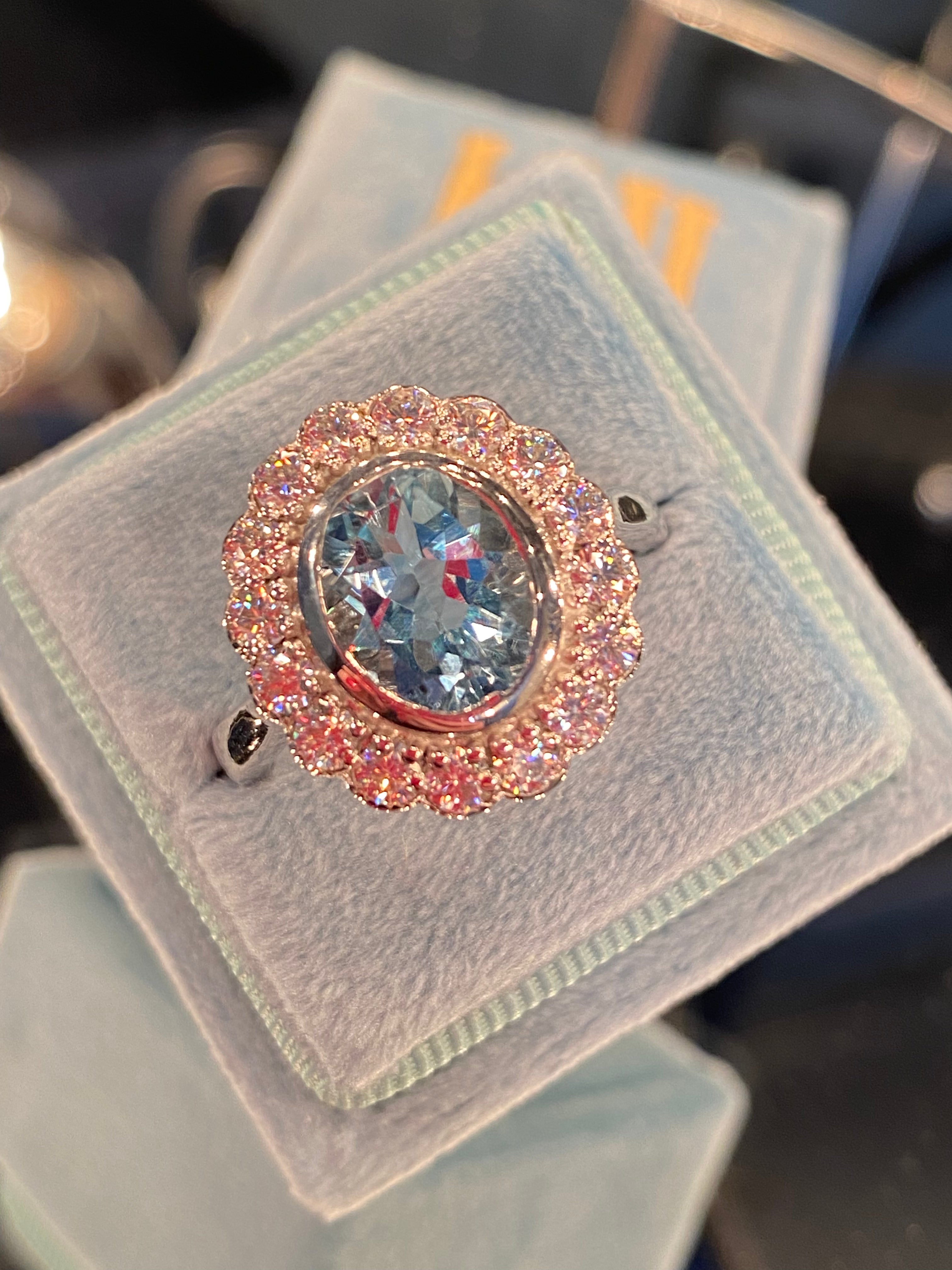 4.25 CTW Oval Cut Blue Topaz and Moissanite Halo Cocktail Ring