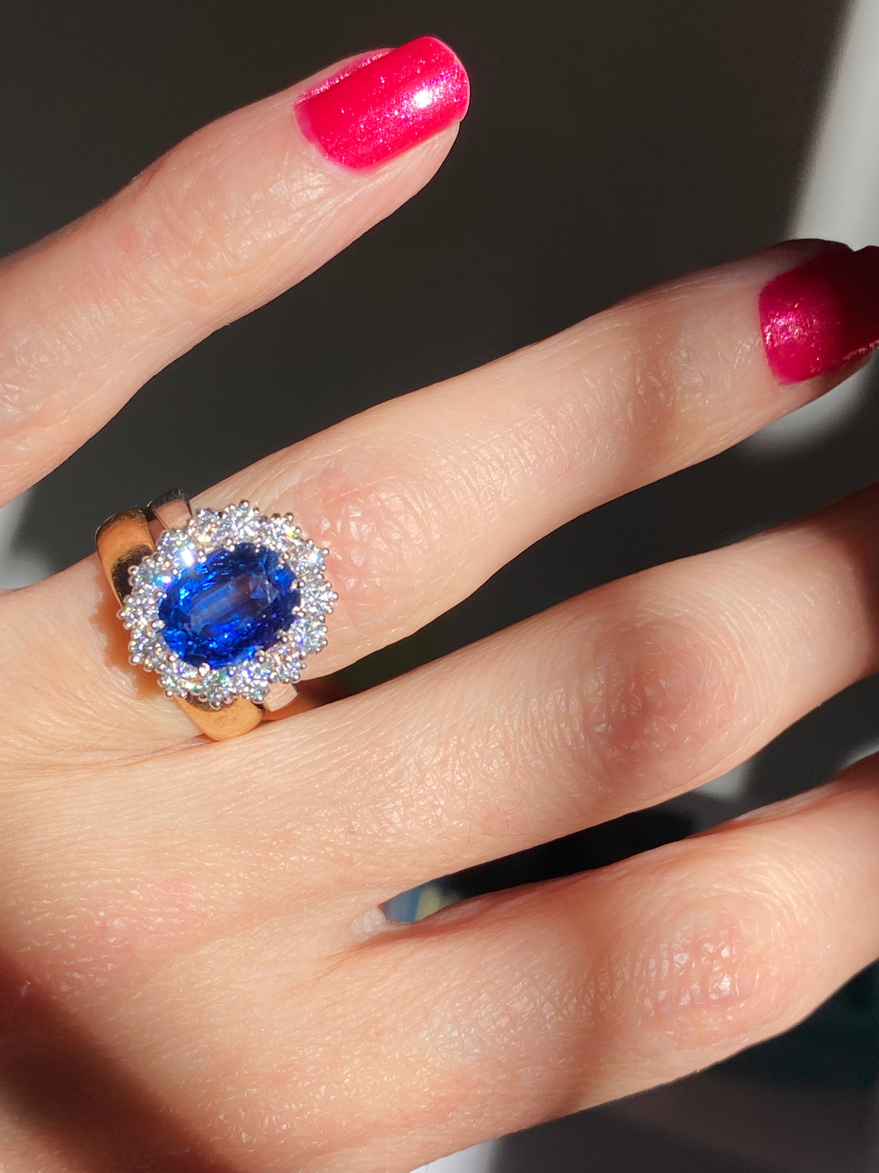 3.50 Carat Oval Blue Kyanite and Moissanite Halo Princess Diana Princess of Wales Kate Middleton Duchess of Cambridge Engagement Ring Katherine James Jewellery 