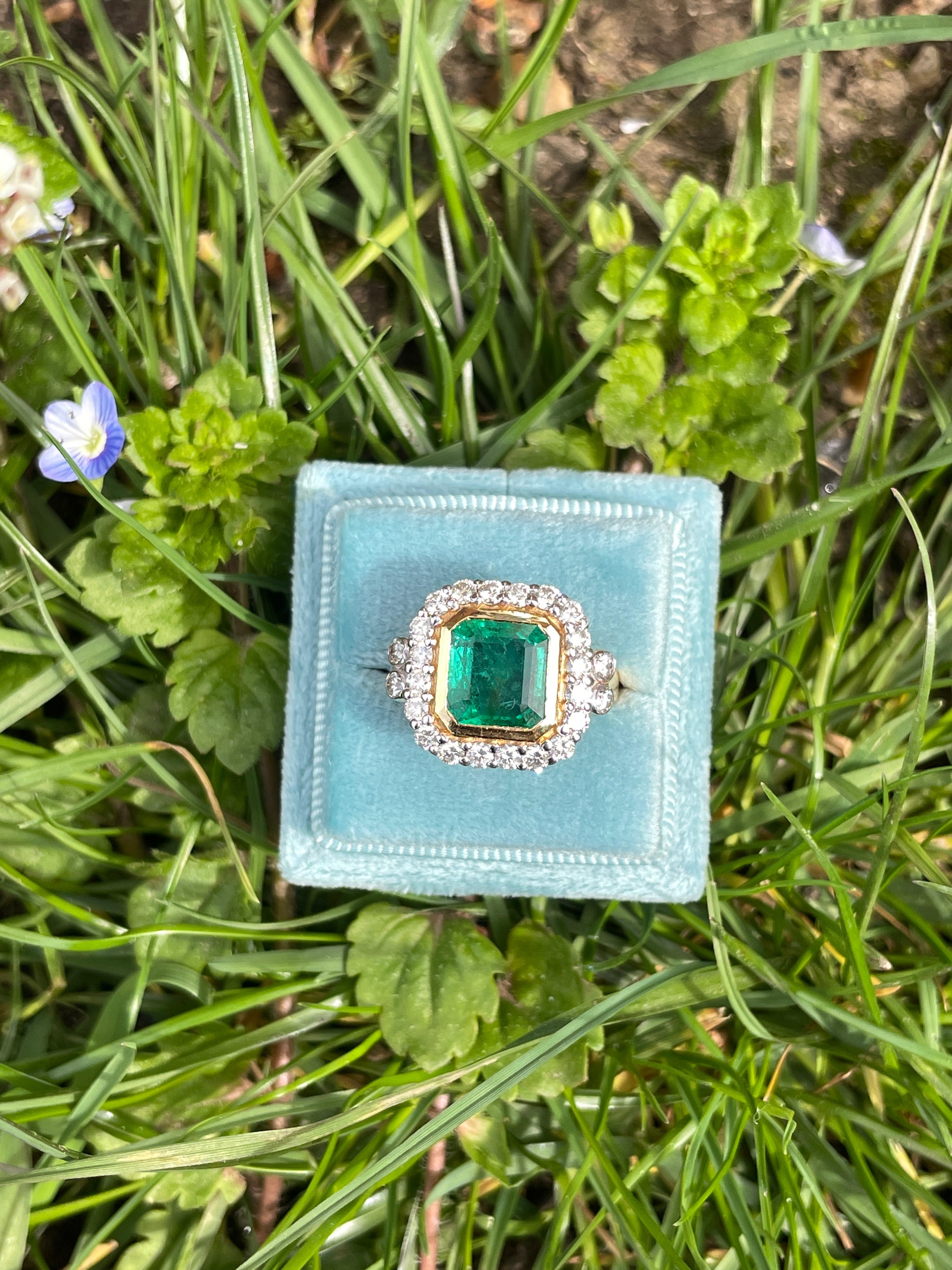 3 Carat Emerald and Diamond Halo Bezel Set Cocktail Engagement Ring in White and Yellow Gold 