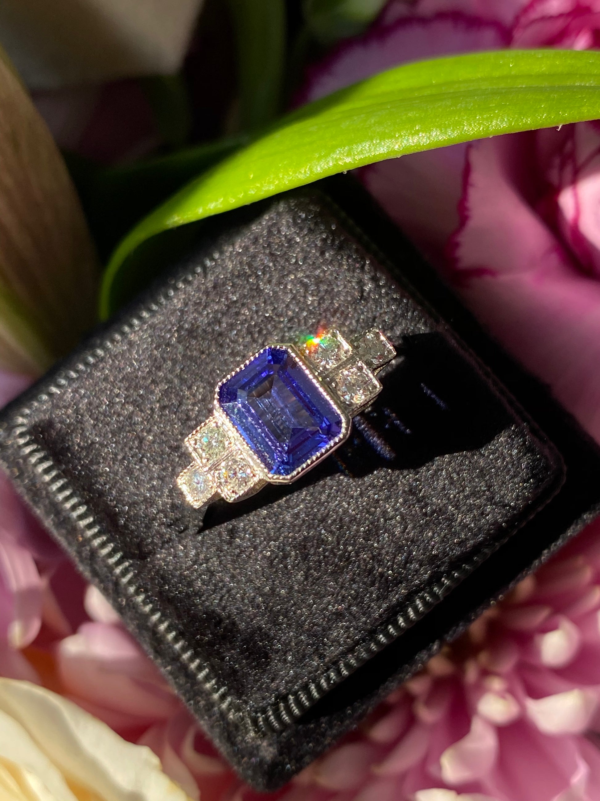 1.50 Carat Emerald Cut Tanzanite and Diamond Engagement Ring in Platinum 