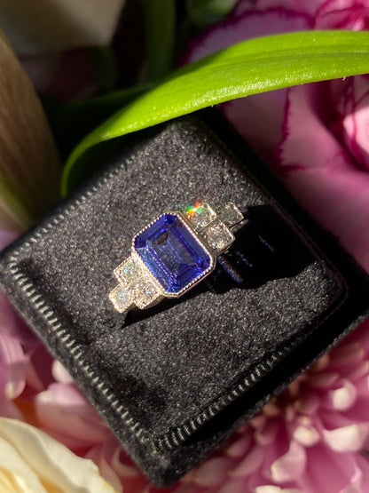 1.50 Carat Emerald Cut Tanzanite and Diamond Engagement Ring in Platinum 