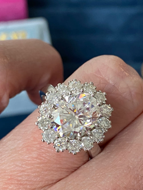 Oval Moissanite Halo Engagement Ring in Sterling Silver 