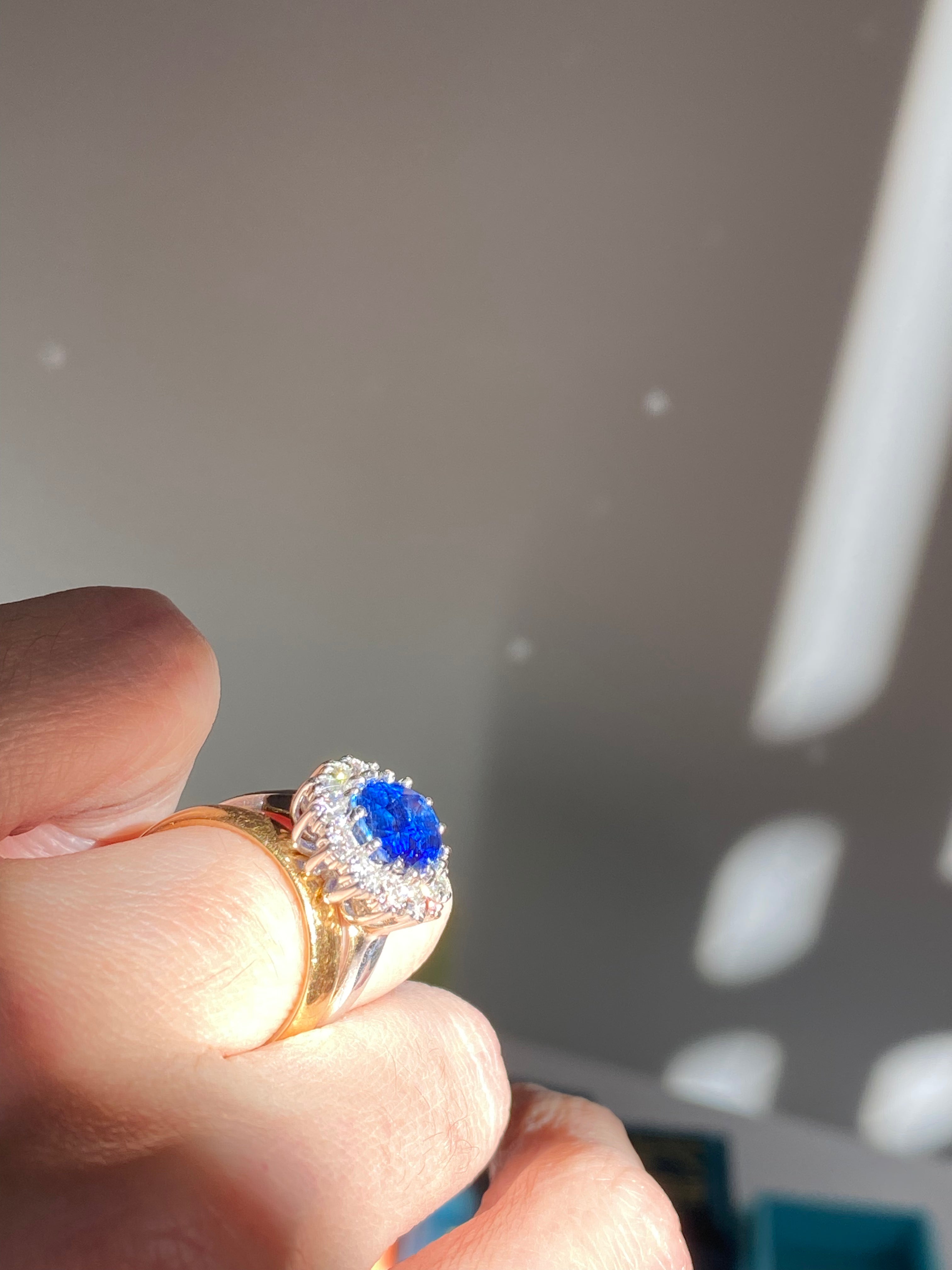 3.50 Carat Oval Blue Kyanite and Moissanite Halo Princess Diana Princess of Wales Kate Middleton Duchess of Cambridge Engagement Ring Katherine James Jewellery 