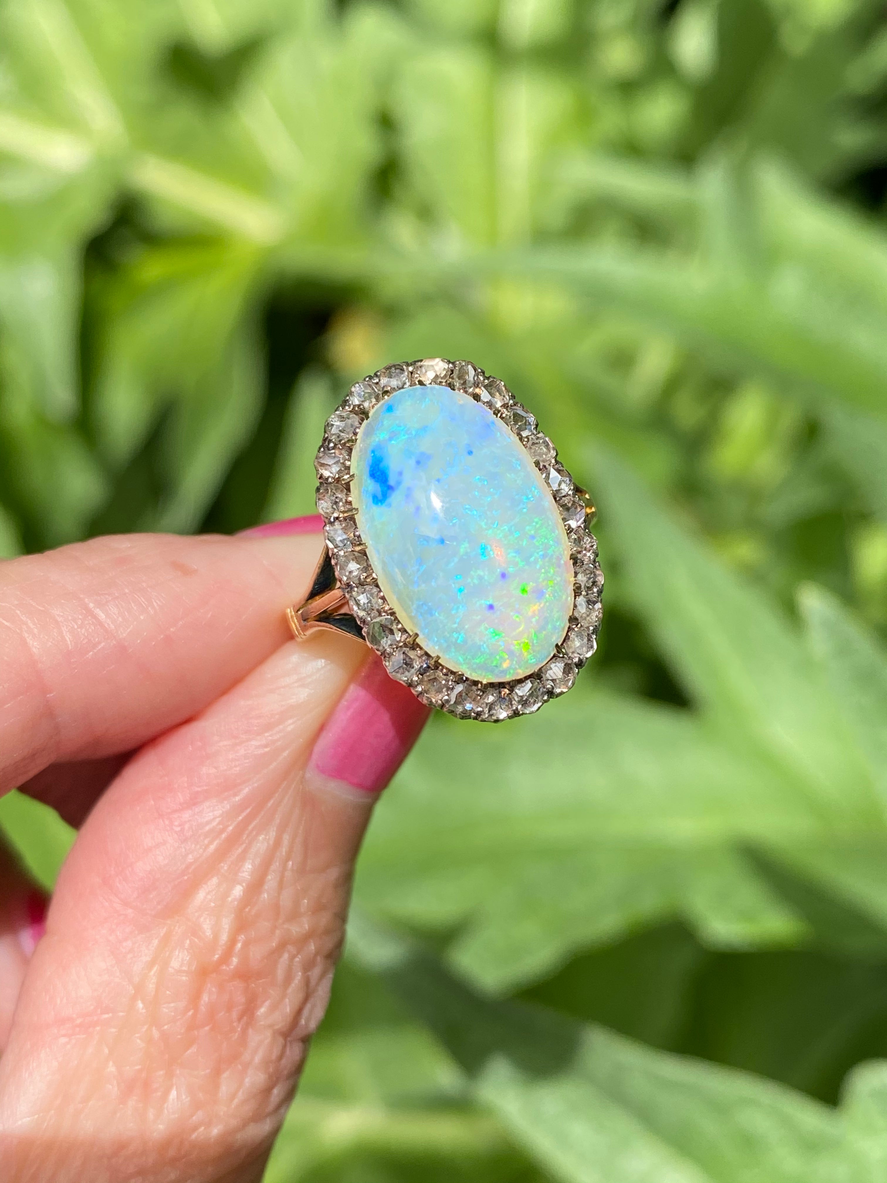 Antique Victorian White Opal and Old Euro Cut Diamond halo cocktail ring in Gold 