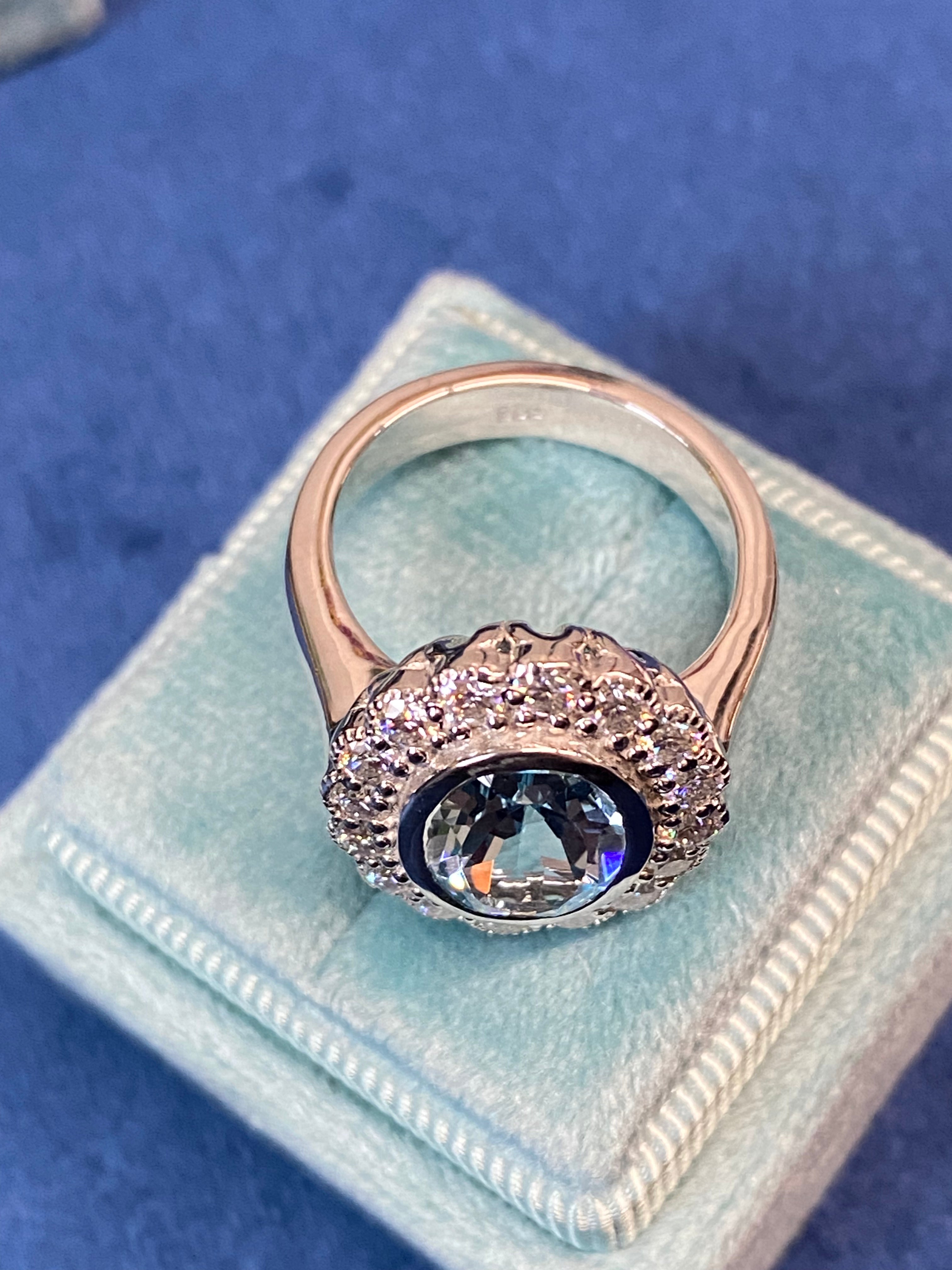 4.25 CTW Oval Cut Blue Topaz and Moissanite Halo Cocktail Ring