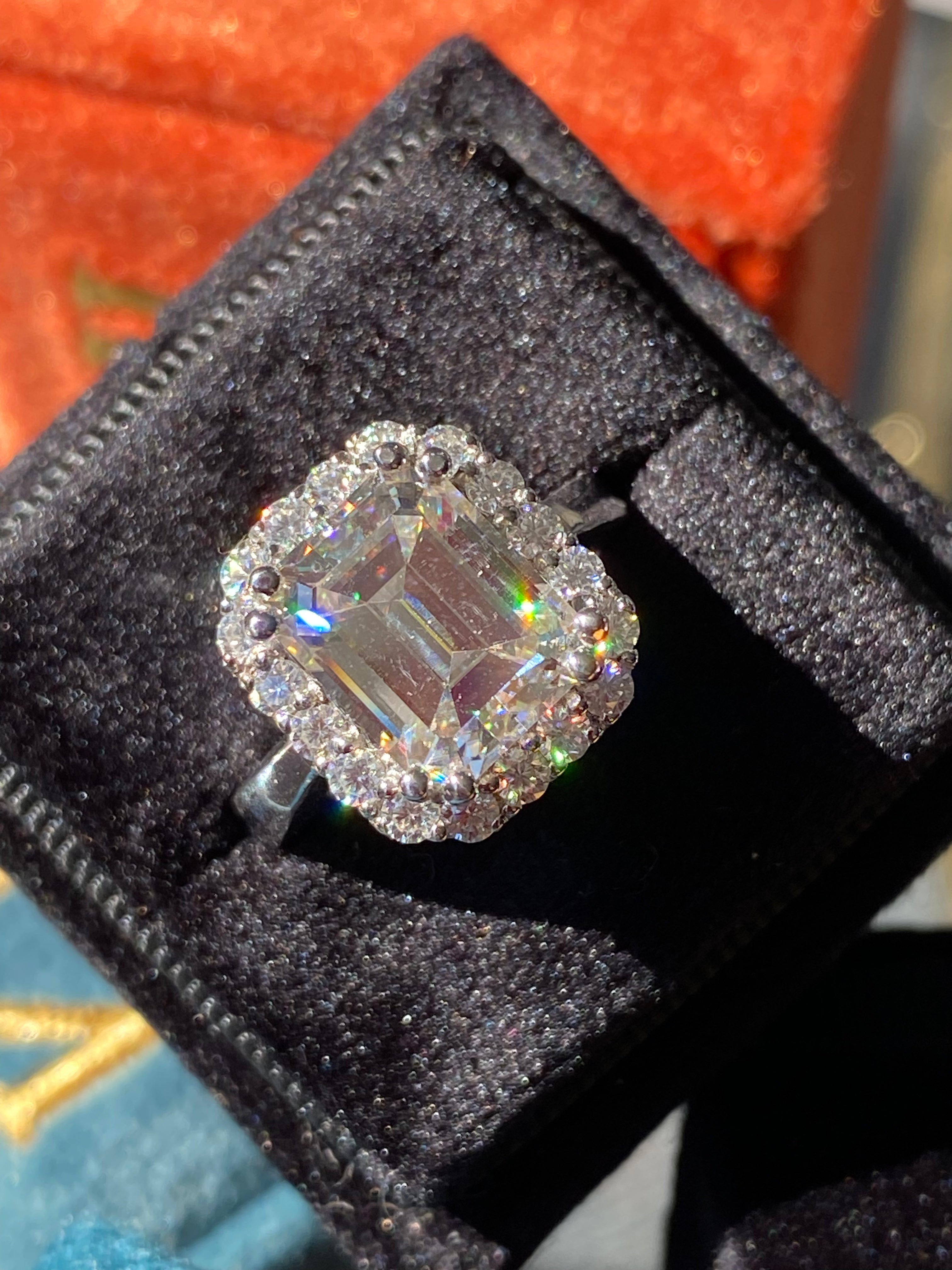 4.50 CTW Emerald Cut Moissanite Halo Engagement Ring in Sterling Silver